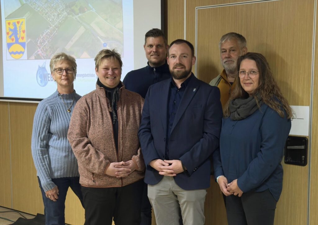 Patrick Rymas inmitten der Bürgermeisterinnen und Bürgermeister von Barwedel, Bokensdorf, Osloß, Tappenbeck und Weyhausen.